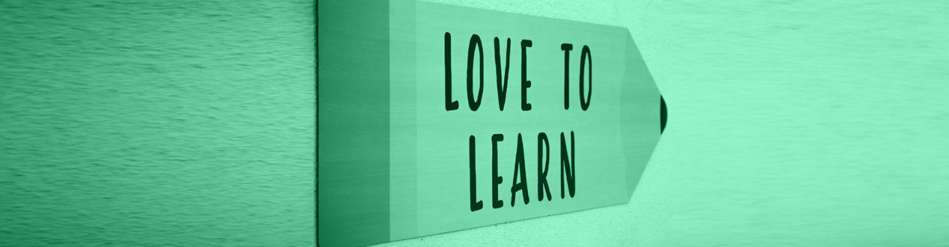 sign with love to learn written on it
