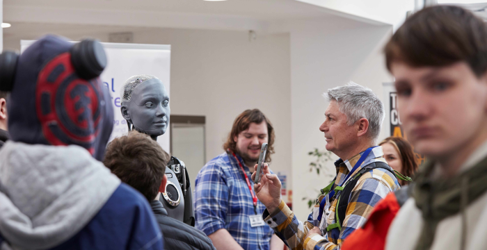 Ameca created by Falmouth-based Engineered Arts engaging with attendees